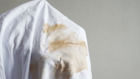 coffee stain on a white t-shirt