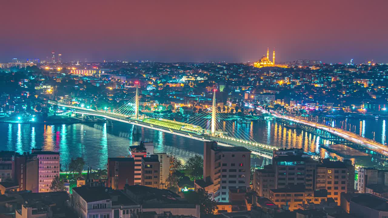 Aerial timelapse view of sunset Golden Horn Metro Bridge and Ataturk Bridge in Istanbul, Turkey.