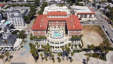 Drone-shot-Casa-Del-Mar-luxury-expensive-hotel-on-Santa-Monica-beach