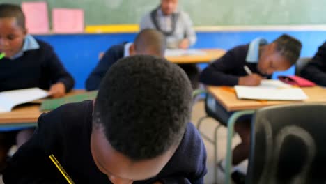 schoolkids studying in the classroom 4k