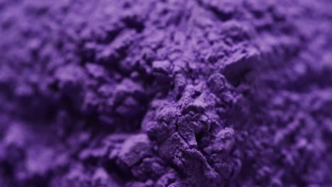 video of close up of purple powder with copy space