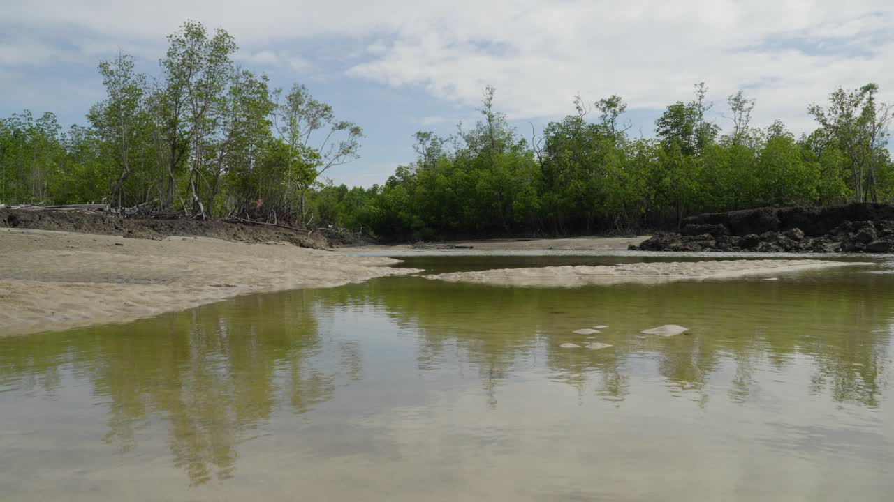 View Of A Small River At Terombol Beach,Kuching,Sarawak.