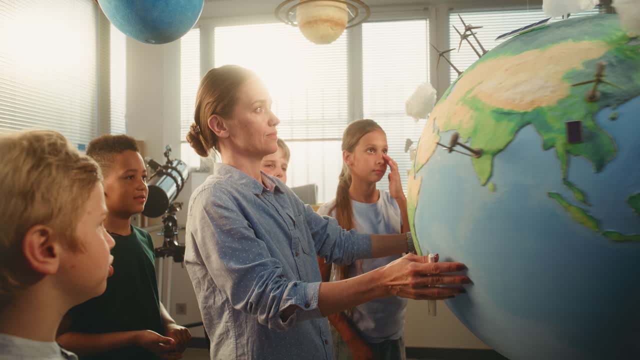 STEM Class on Renewable Energy Female Teacher Explaining Energy Resources to Elementary School