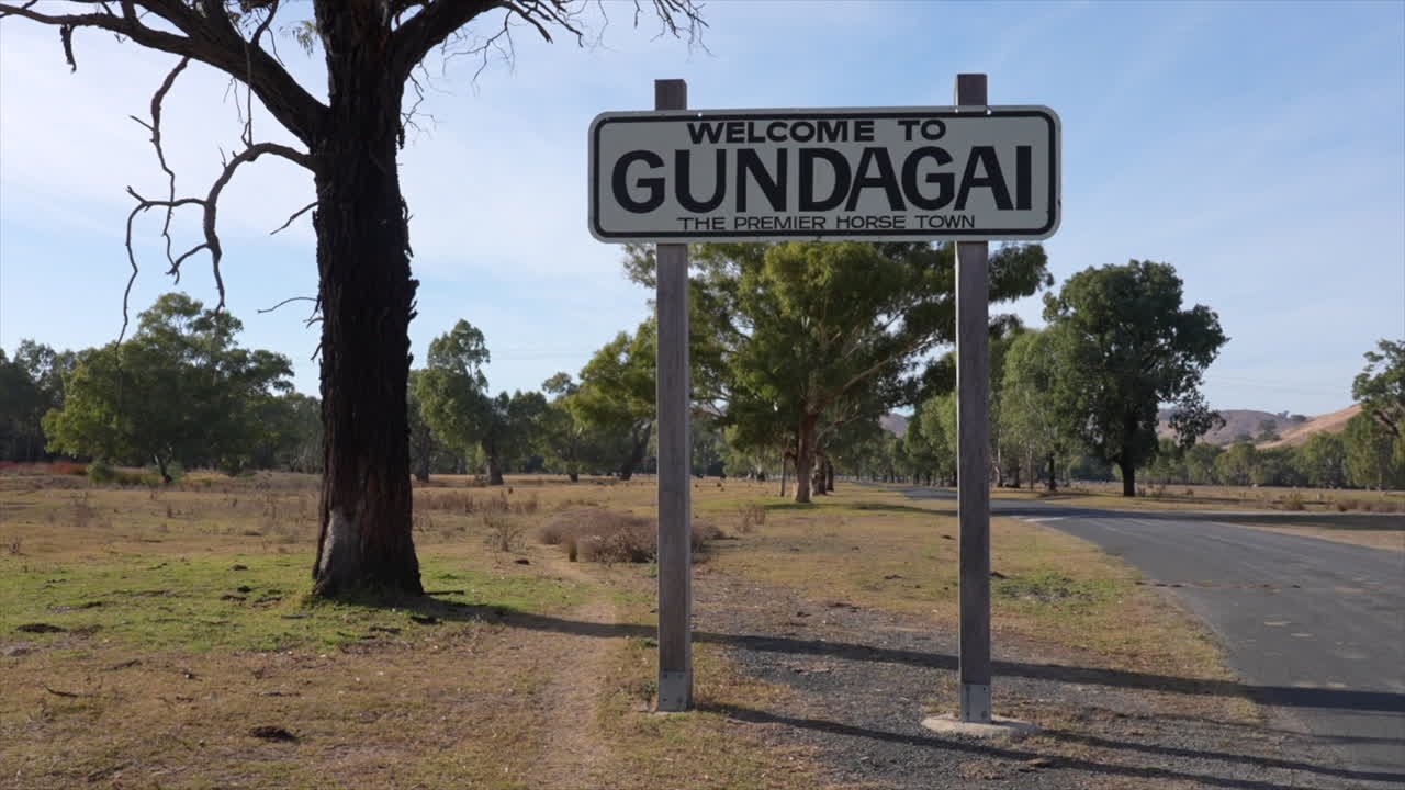 Mid shot of welcome to Gundagai sign, New South Wales, Australia