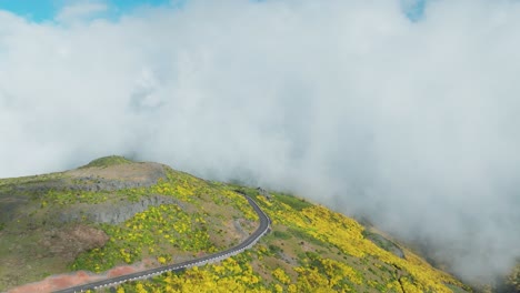 Clouds-Touching-Mountain-With-Autumn-Foliage-In-Madeira-Island,-Portugal