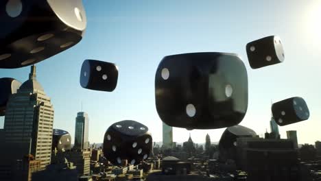 aerial view of enormous black dice hovering over a cityscape, capturing a unique perspective on urban architecture and chance in motion