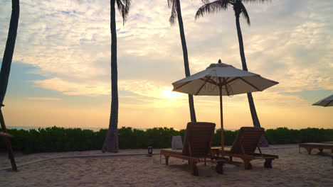 umbrella-with-beach-chair-and-ocean-sea-background---holiday-and-vacation-concept