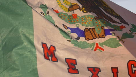 mexican flag close up flowing slowly in the wind