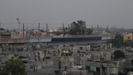 A-timelapse-of-Delhi-Metro-running-through-the-dense-population