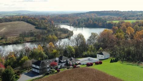 Large-contemporary-modern-home,-mansion-overlooks-river