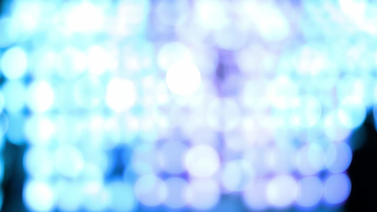 Blue abstract bokeh background of light from Thai lanna lantern at night.  Concepts of celebration in Yi Peng Festival.