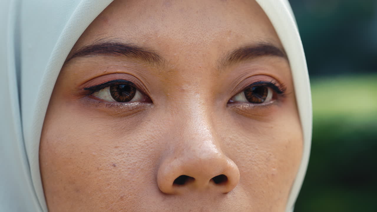 Close-up of a woman's eyes wearing a hijab