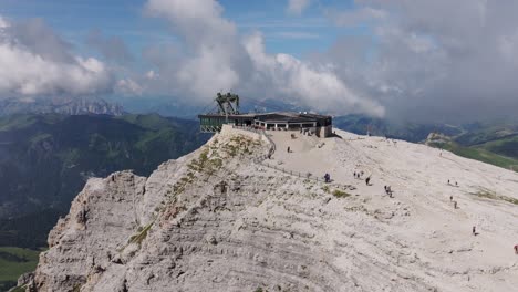 mountain peak viewpoint with cable car and restaurant