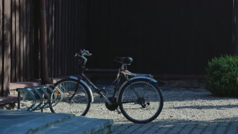 old bicycle parked next to the church