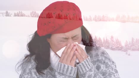 Animation-of-woman-blowing-her-nose-against-winter-scenery
