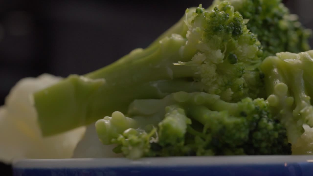 Broccoli in close-up with soft light on fresh green vegetable textures for healthy eating, nutrition and organic meal