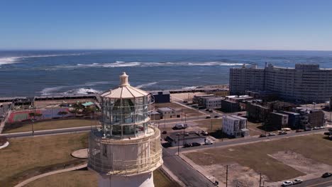 jersey shore lighthouse revealed frame left with backwards aerial movement