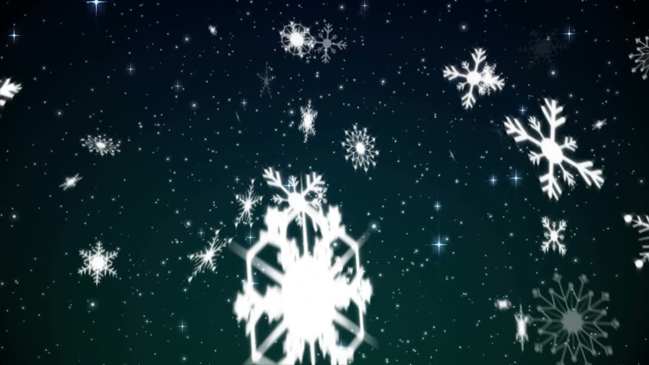 Snowflakes drifting into view across starry teal-to-navy sky creating swirling snowfall effect