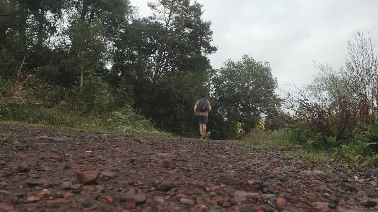 Trail Runner Passes Camera During Morning Exercise