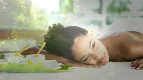 relaxing spa treatment over serene nature background, woman lying with flower in hair