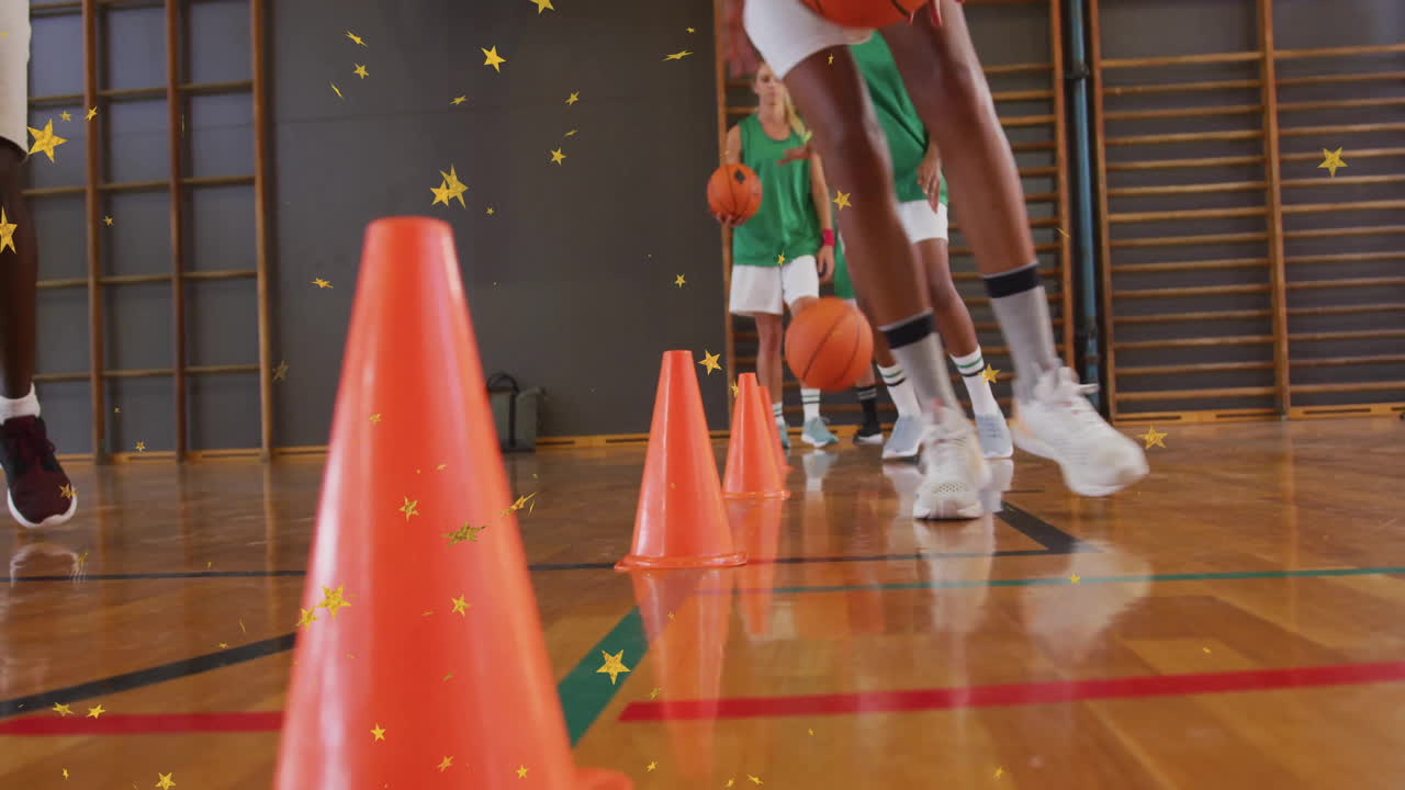 basketball teammates practicing dribbling drill around cones in gym, with animated skill icons