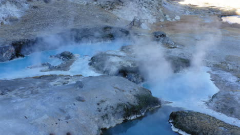 hot springs at hot creek geological site, famous landmark in inyo national forest, us, aerial circling