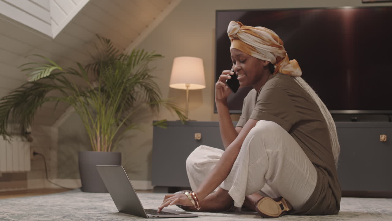 Young Black Woman Having Phone Conversation