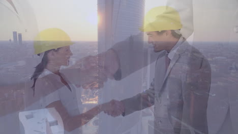 shaking hands over cityscape, businesspeople symbolizing partnership and collaboration