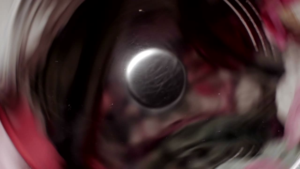 Fast spinning laundry in washing machine.