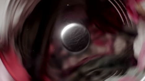 fast spinning laundry in washing machine.
