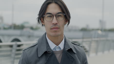 Portrait of a man in a city setting