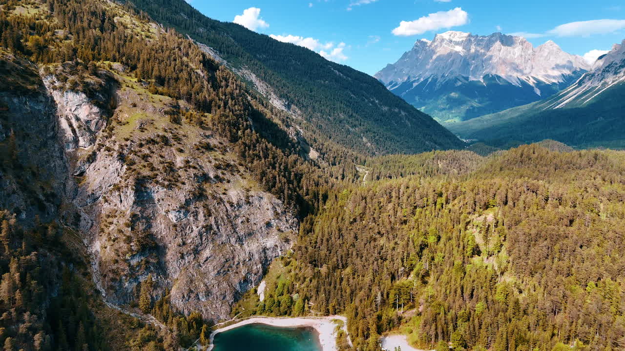 Drone flight over the spectacular pine tree woods covering the gorgeous mountains. Stunning rocks in Europe wildlife. Aerial view.