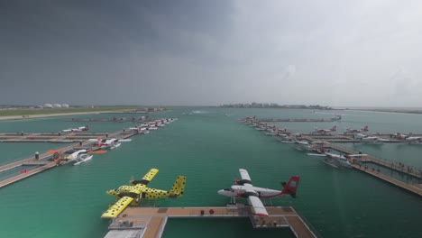 tropical seaplane airport with floating dock in indian ocean, maldives