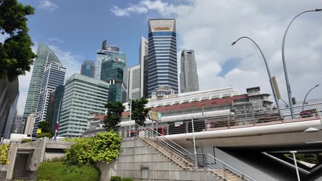 singapore cityscape with skyscrapers and the historic fullerton hotel
