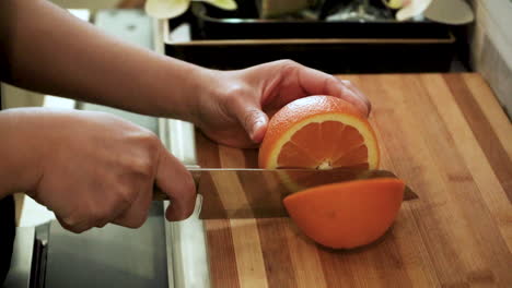 woman slicing an orange at a spa bar