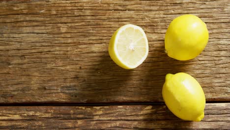 Lemon-on-a-wooden-table-4k