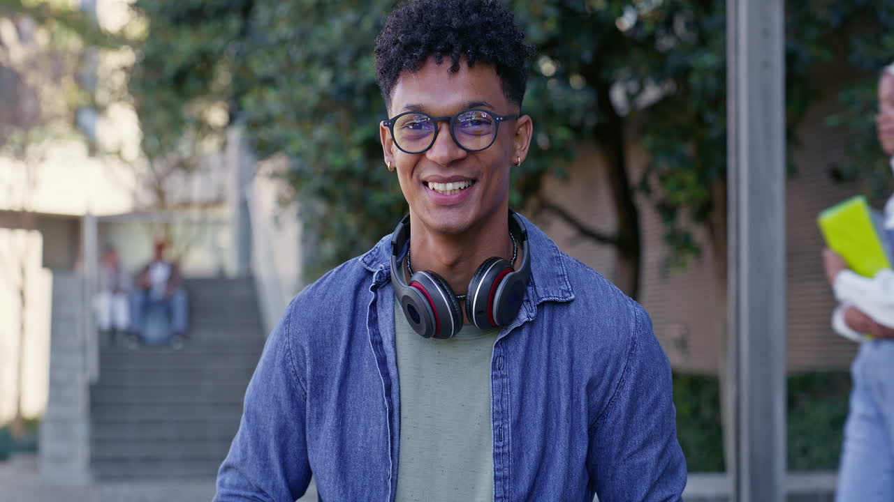 Portrait of a Smiling Young Man with Headphones
