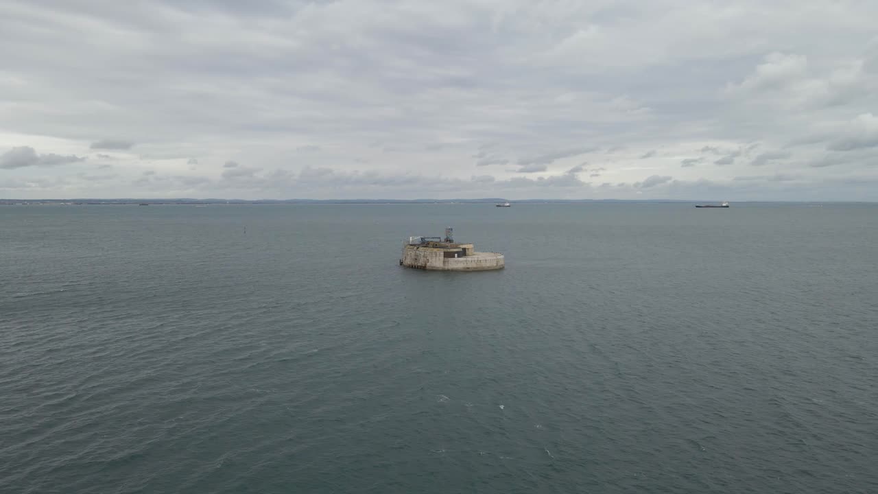 Aerial view St Helens Fort, sea fort in the Solent close to the Isle of Wight, was built as result of the Royal Commission on the Defence of the United Kingdom of 1859, drone moving towards the fort