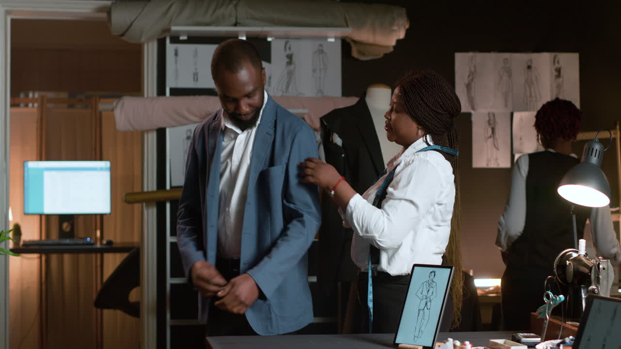 Man trying on elegant blazer