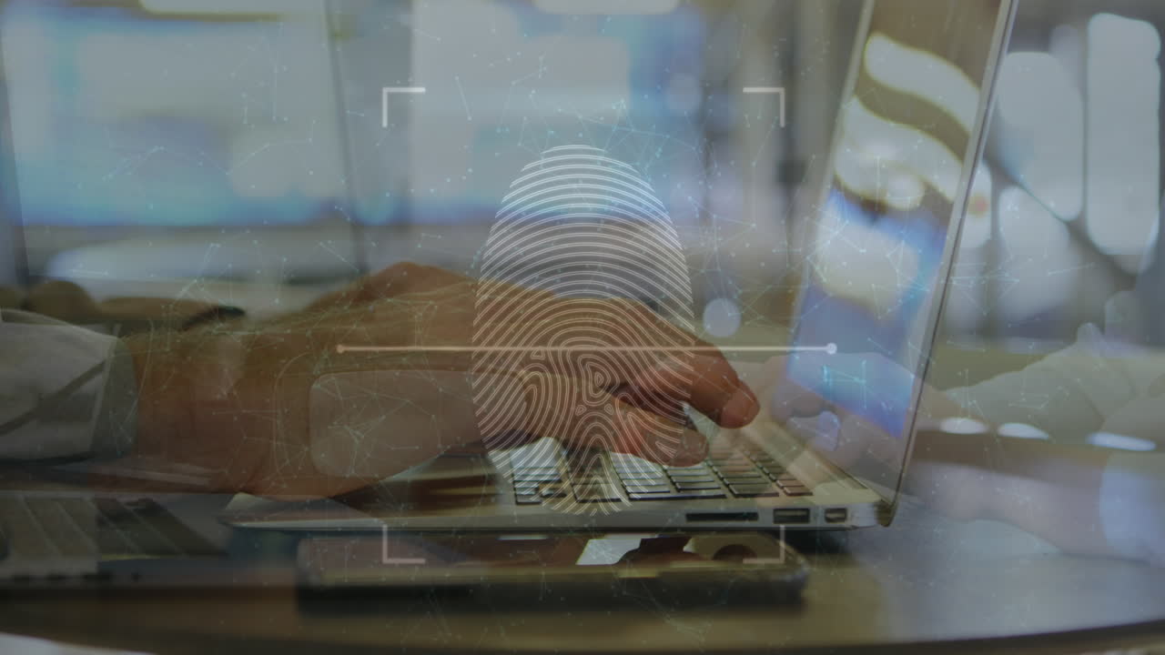 Animation of fingerprint and connected dots over cropped hands of caucasian man using laptop