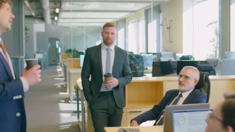 office workers chatting on coffee break