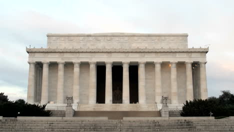 a steady trickle of tourists visits the lincoln memorial in washington dc