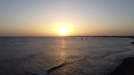 beautiful-sunset-over-the-bay-of-santa-maria-on-sal-,-many-boats-in-the-water