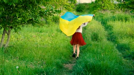 patriot child with ukrainian flag. selective focus. kid.