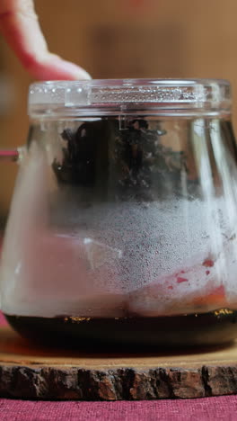 steeping tea in a glass teapot