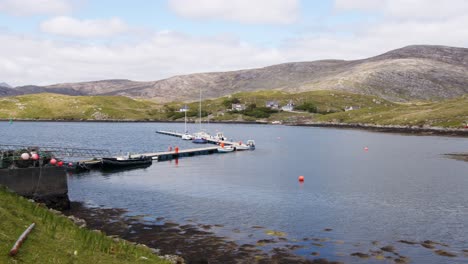 Panning-midday-shot-of-the-pontoon-in-the-harbour-on-the-Isle-of-Scalpay