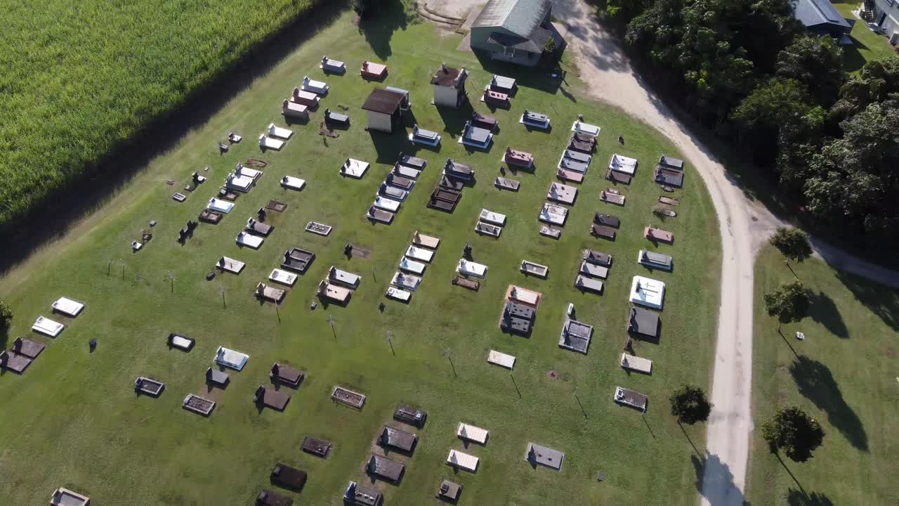 4K drone shot of a very tidy graveyard flying over headstones in North Queensland, Australia