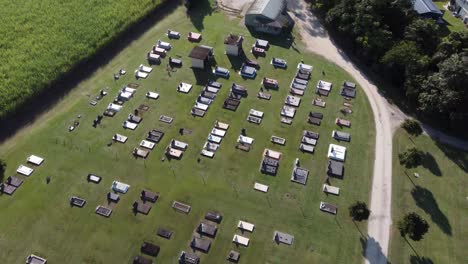 4k drone shot of a very tidy graveyard flying over headstones in north queensland, australia