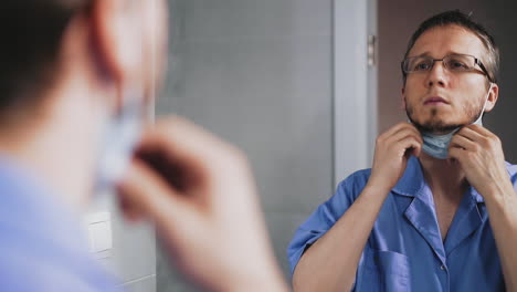 portrait of young doctor dressed as intensive care worker