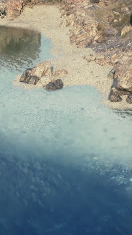 aerial view of a river with clear blue water